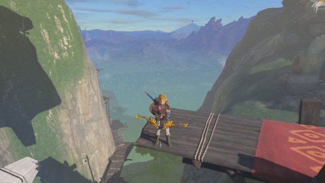 Link with bow in Kakariko Village in The Legend of Zelda: Tears of the Kingdom.