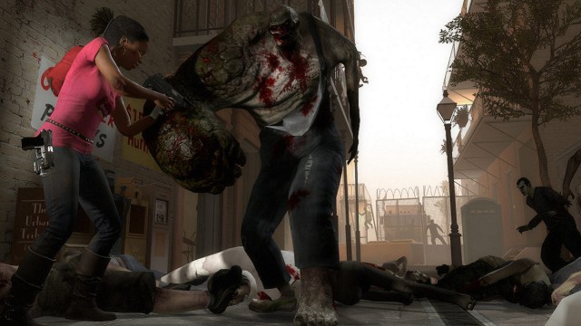 Left 4 Dead 2: Rochelle fighting a Charger.