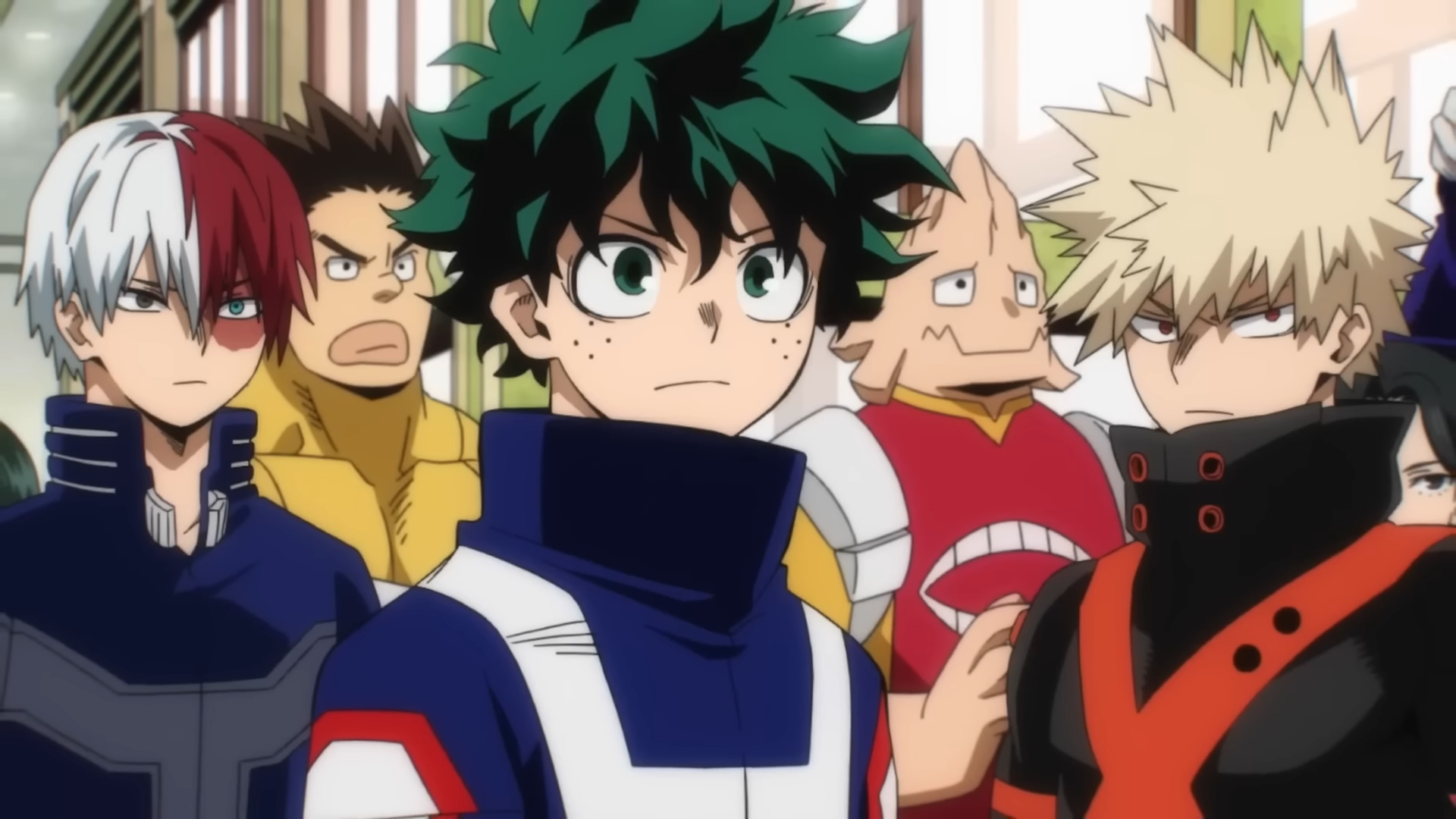 Izuku Midoriya, standing in front of Katsuki Bakugou and Shouto Todoroki