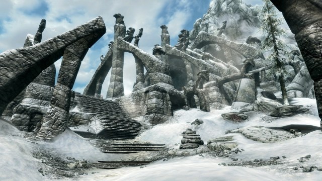 The Elder Scrolls: image from Skyrim showing the snow-covered entrance to Bleak Falls Barrow.