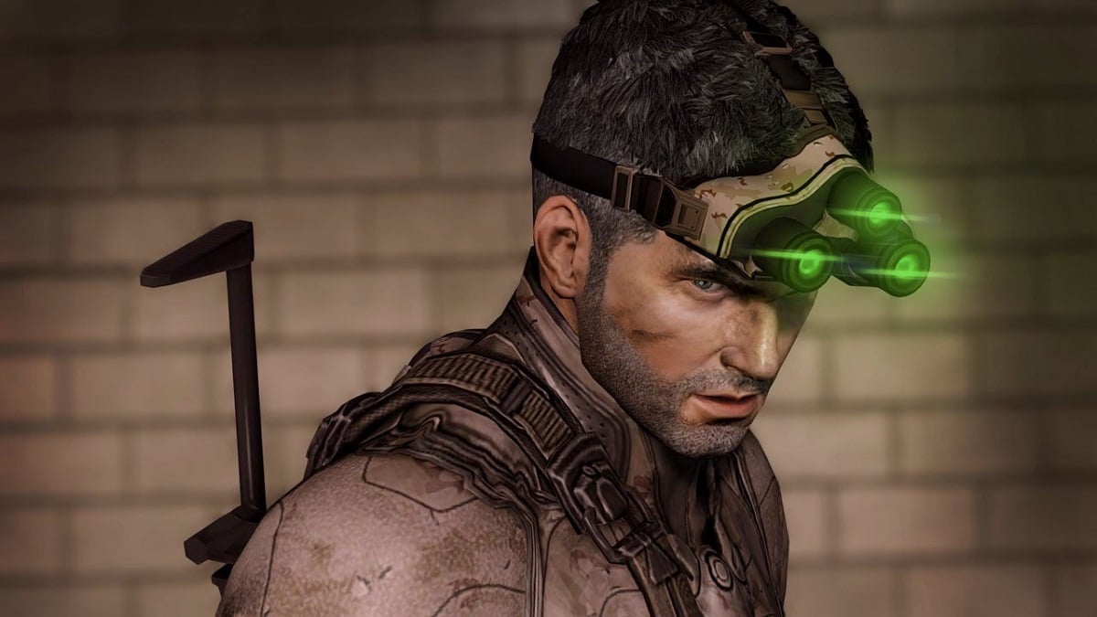 Splinter Cell: a well-lit Sam Fisher wearing his trademark night vision goggles on his head.