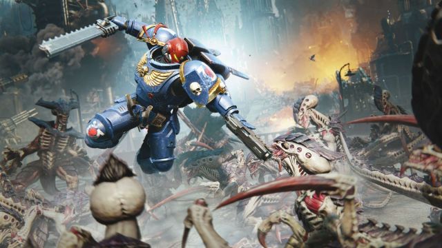 ultramarine diving at tyranid in warhammer 40k space marine 2