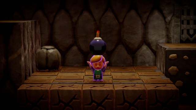 Link readies a bomb in Eldin Temple.