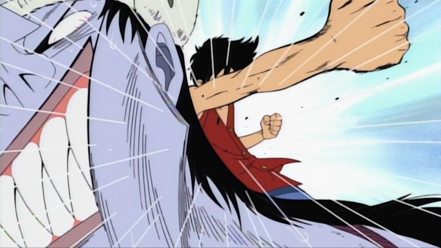 Luffy punching Arlong in One Piece