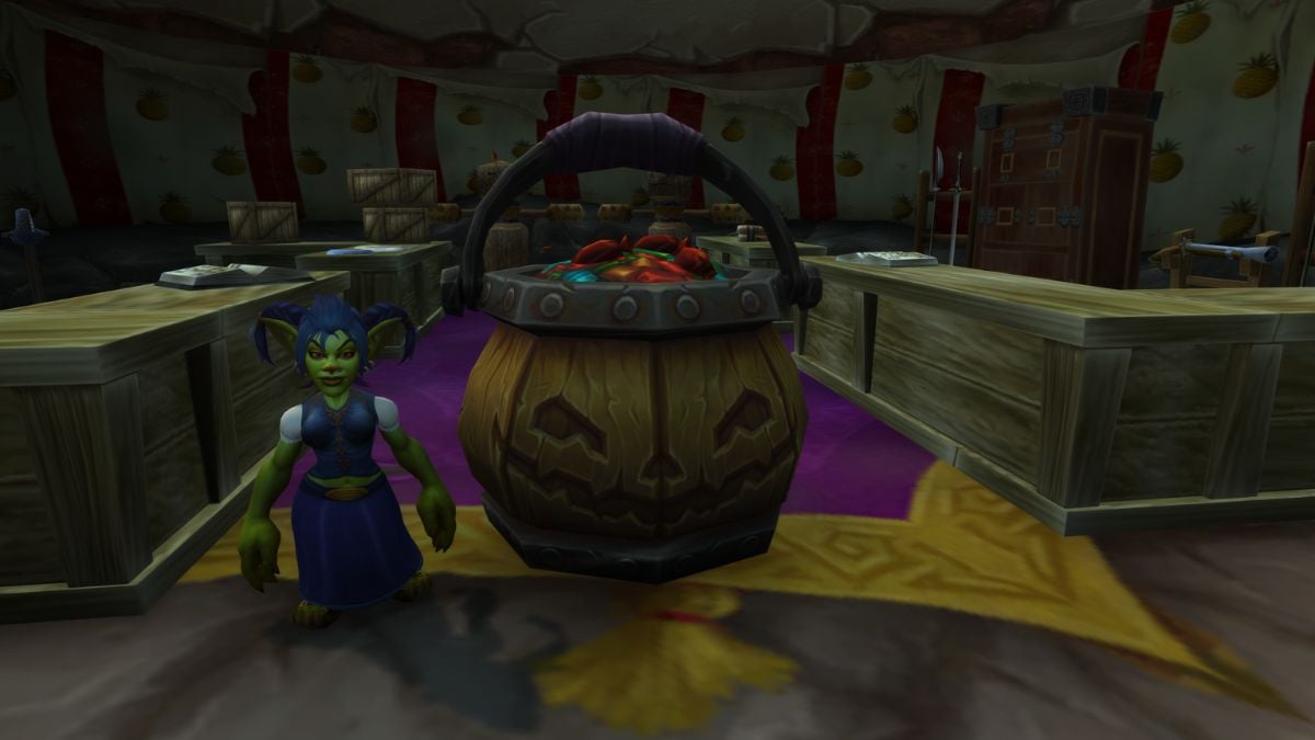 A goblin stands beside a candy bucket