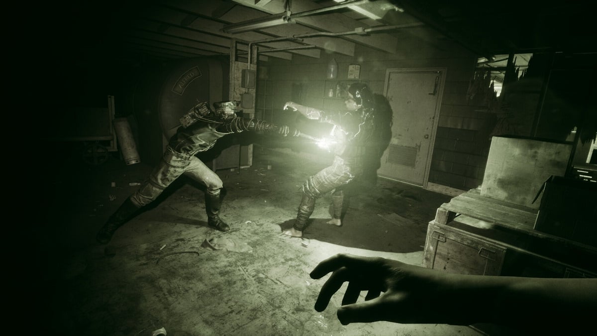 Outlast Trials: a nightvision image of someone being violently knocked back with a taser.