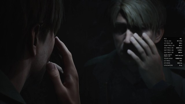 Silent Hill 2: James Sunderland looks at himself in a dark mirror as he touches his cheek.