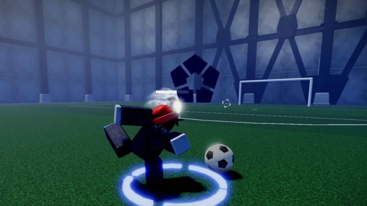 Player kicking the ball towards the goal