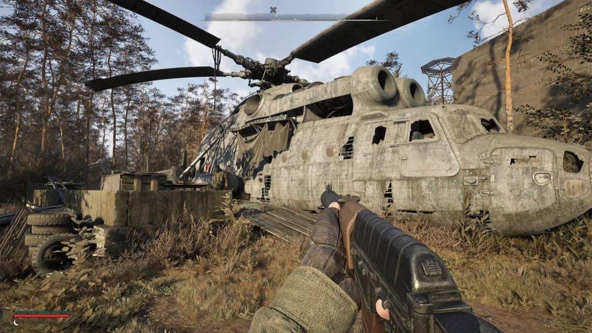 A screenshot of Stalker 2 Gameplay with the player holding an AK and facing a military helicopter.