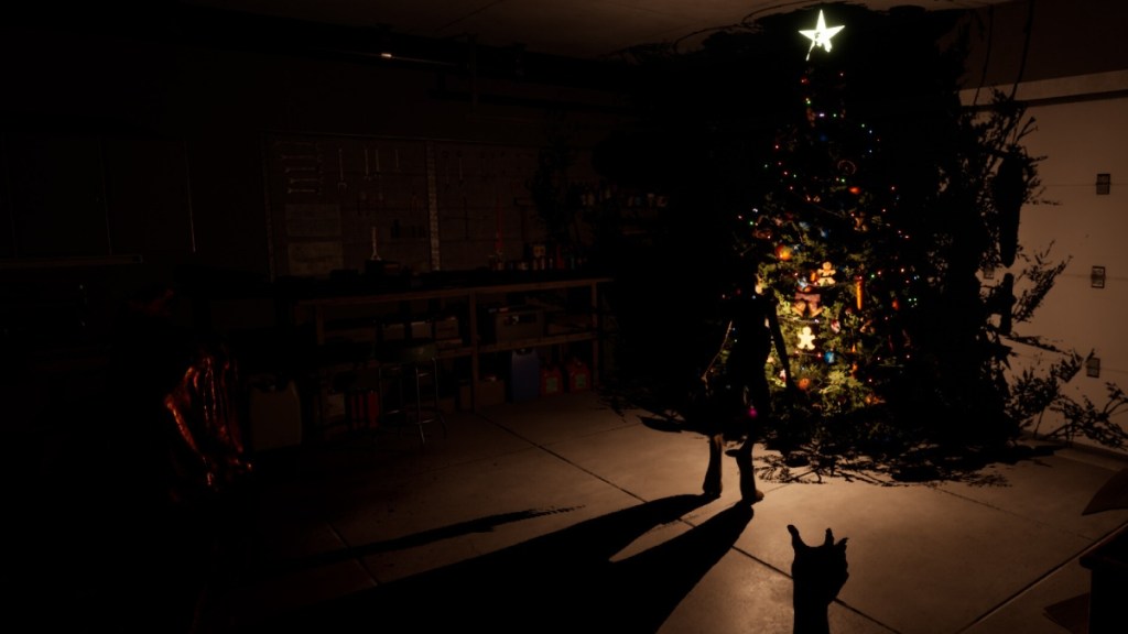 A small monster stands in front of a Christmas tree in Christmas Nightmare