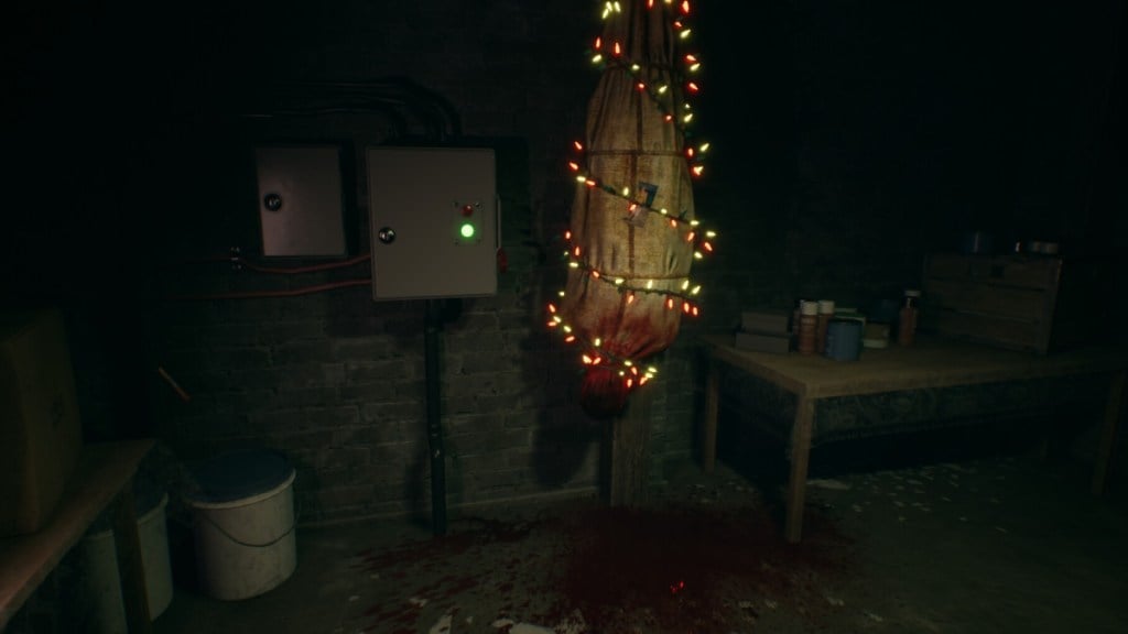 A bagged body hangs in a basement upside-down, while wrapped in Christmas lights in Crimson Snow