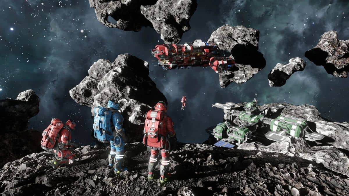 Space Engineers 2 key art showing several of the space Engineers in space with asteroids floating past.