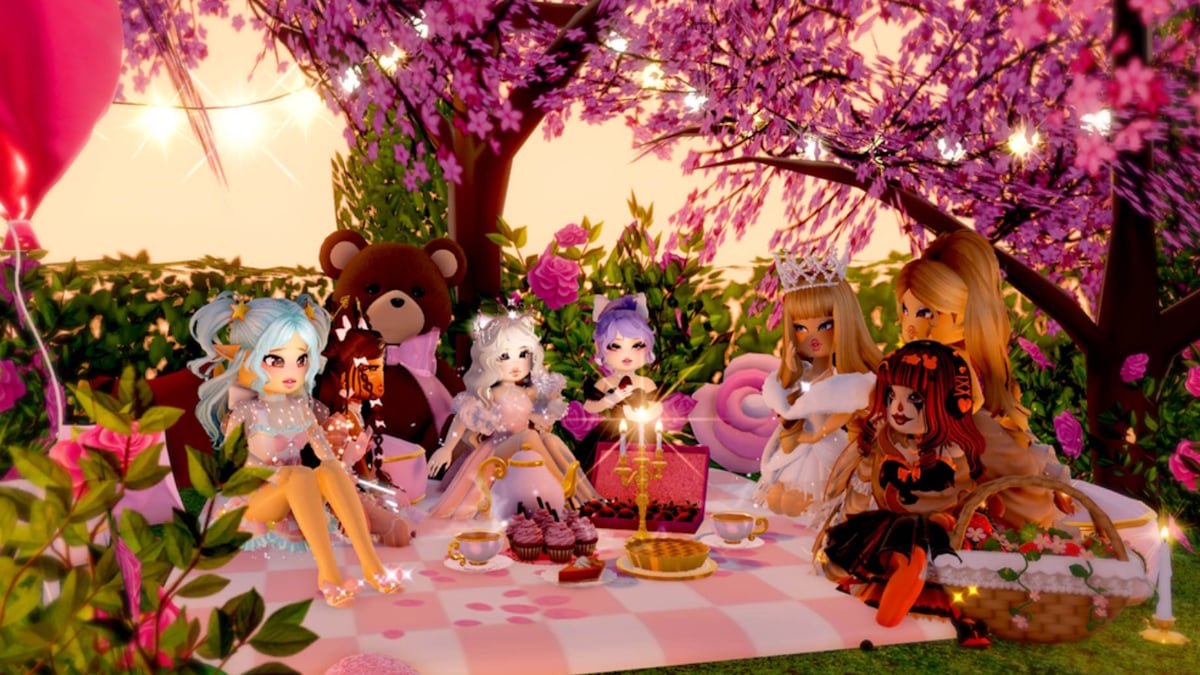 Royale High players enjoying a picnic under pink trees