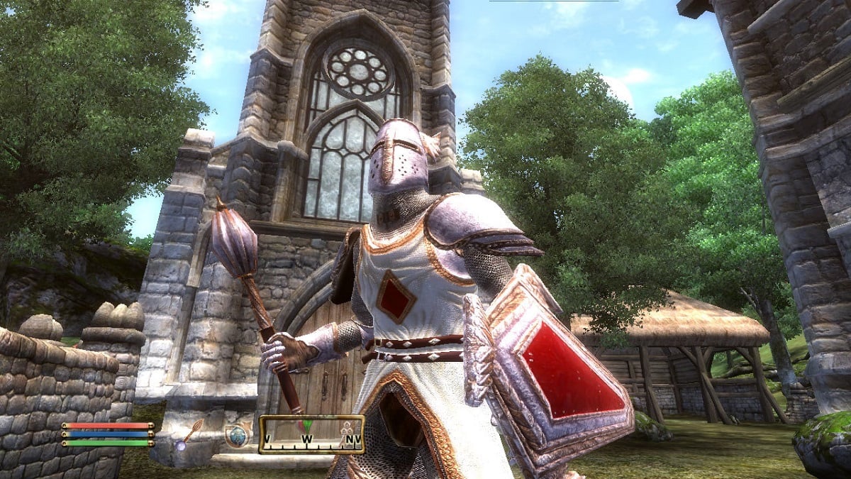 Oblivion: a night in shining armor advances on the player, with a church in the background.