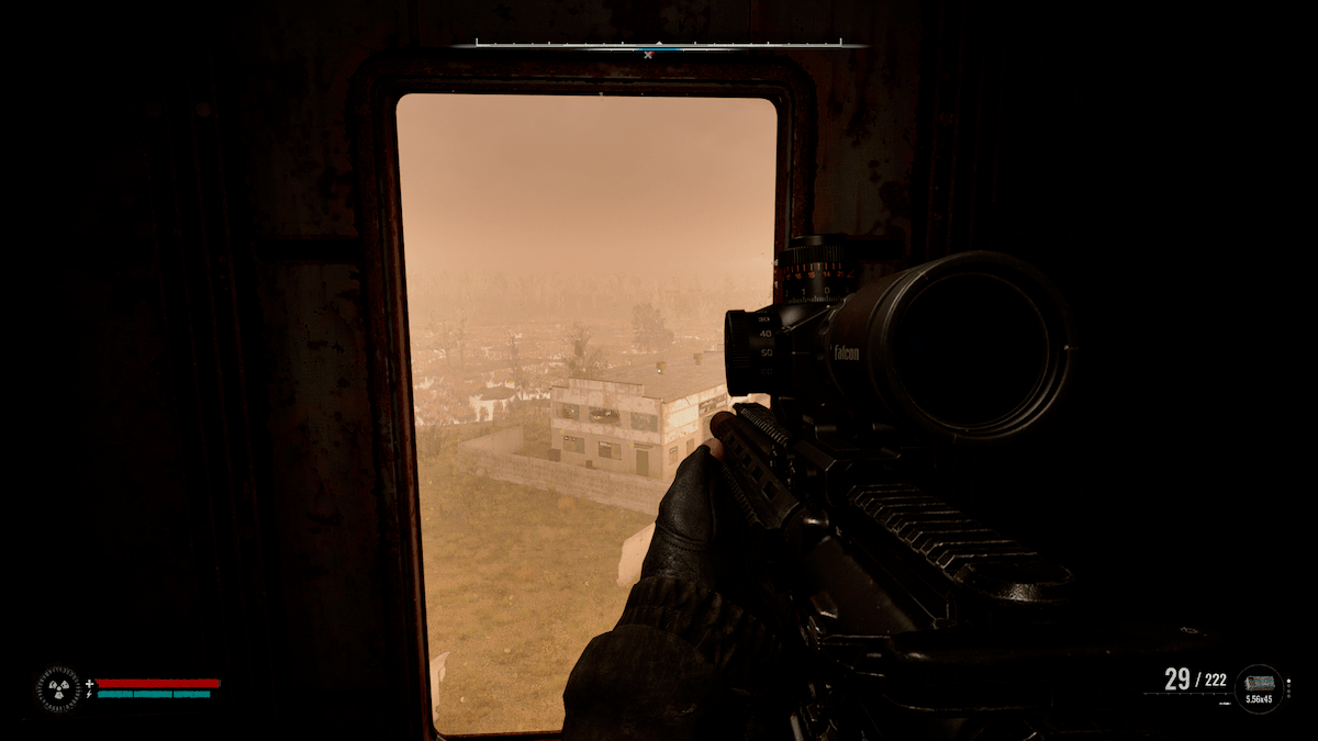 An image of Stalker 2's lead Skif holding the Clusterfuck rifle, in a sniper's nest at the top of a high tower.