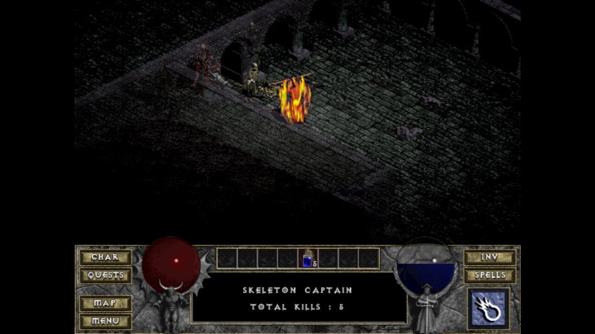 A character from Diablo surrounded by flames in a dungeon.