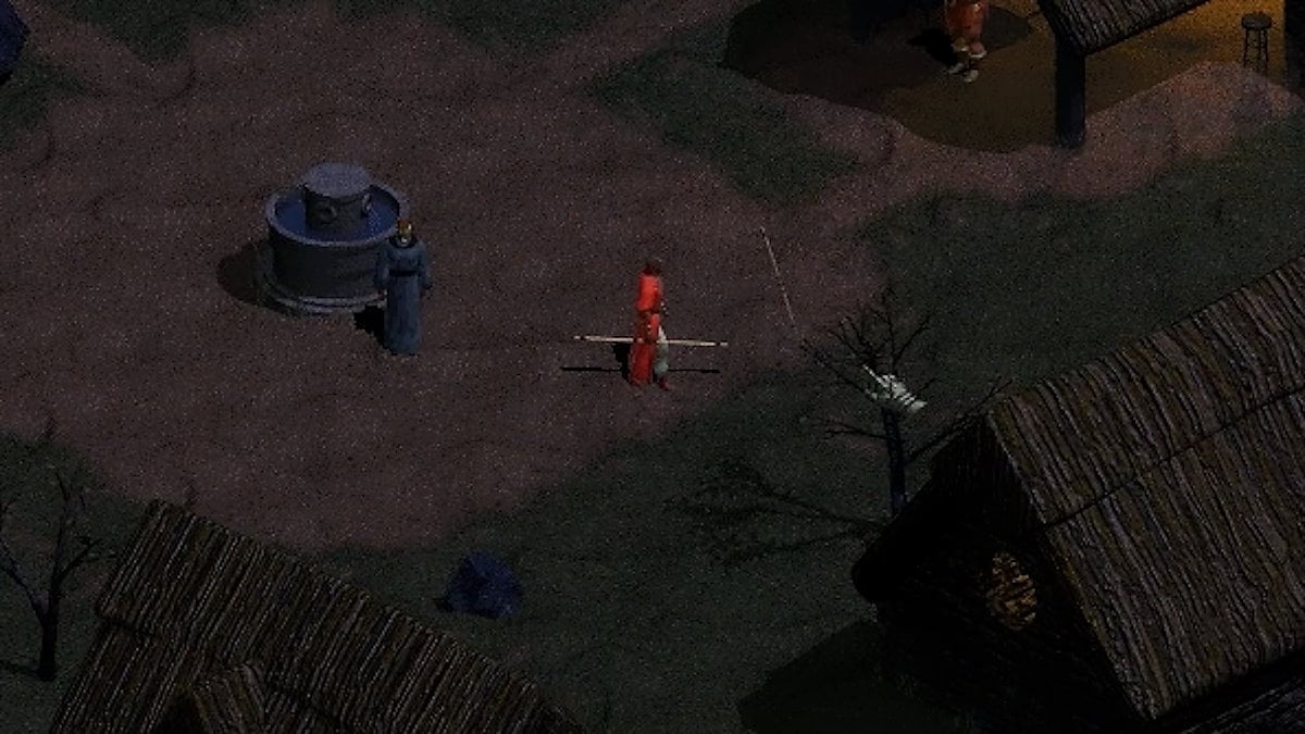 A sorcerer character with red robes in the starting area of Diablo.